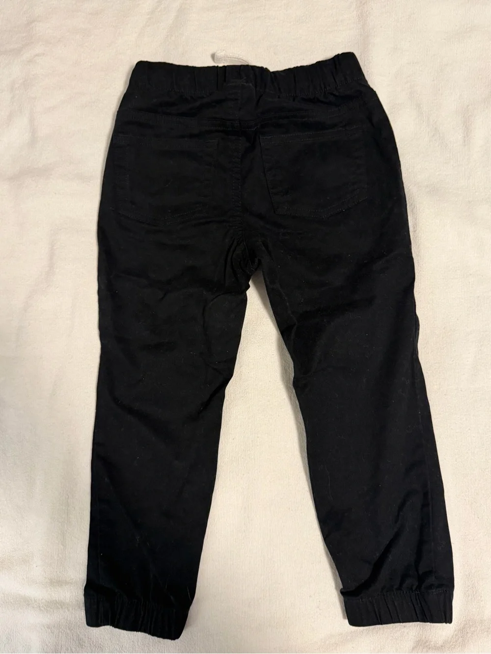 Pant Cat & Jack Black size 3T and cover L/S size 2T back one side has a stain